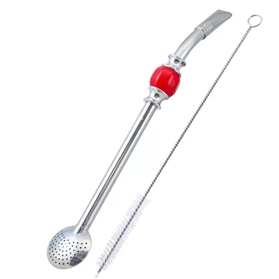 Bombilla Bomba Bomba punaisella kivellä