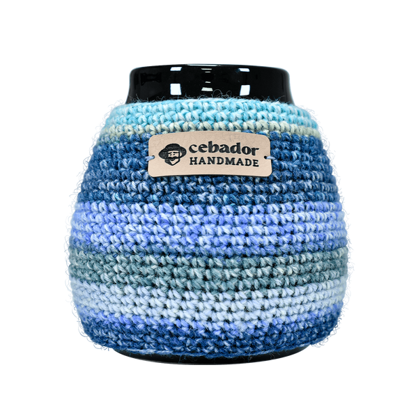 Käsintehty kurkunlämmitin Dolores kalebassilla.